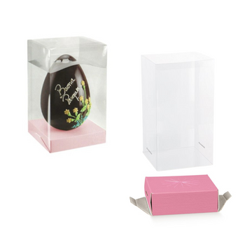 Scatola trasparente porta uovo, mostrata con uovo di pasqua all'interno, e vuota e base porta uova rosa mostrata fuori